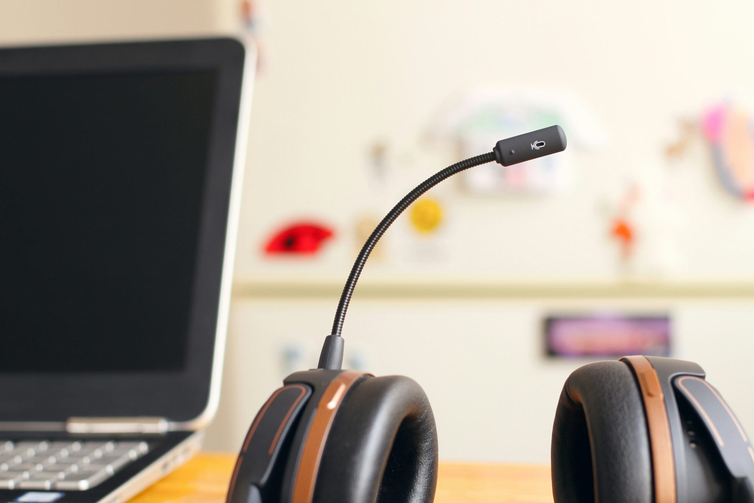 A telephone headset resting on a desk in an office